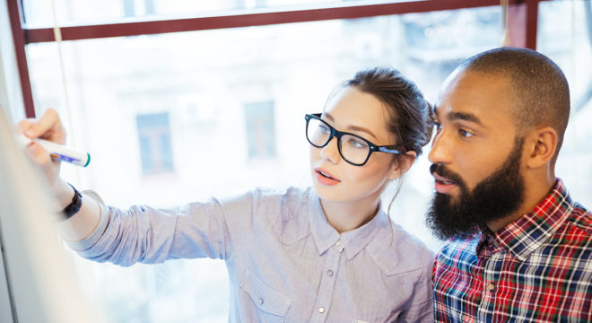 Business people working with whiteboard